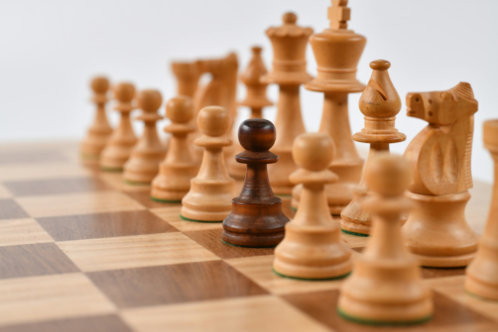 Chess pieces on a board representing strategy and leadership